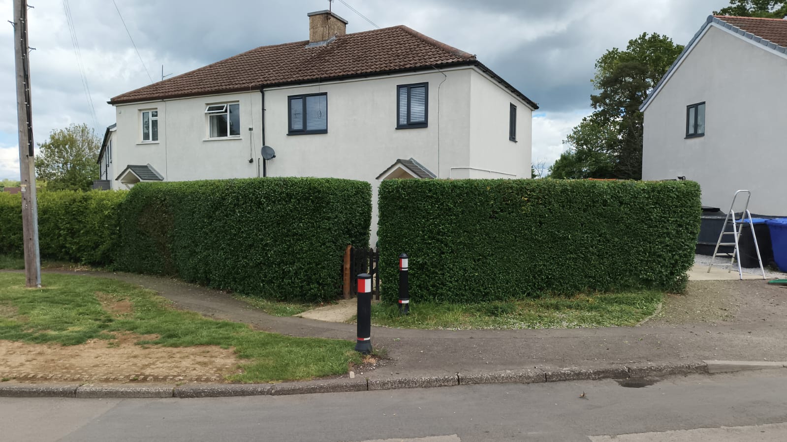 Front hedge shaped and squared off after cutting